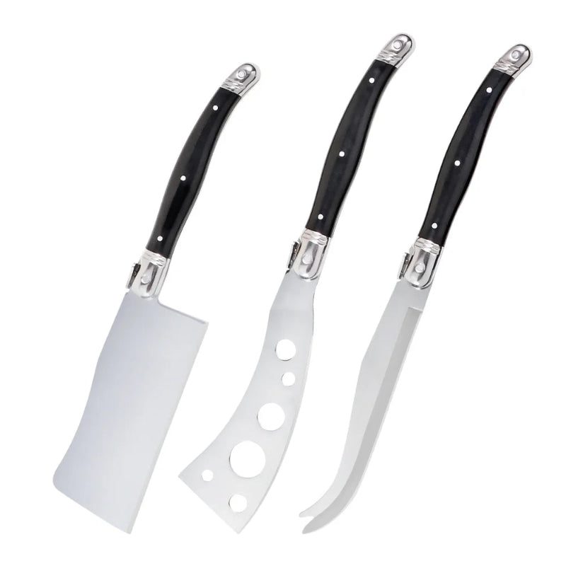 Three cheese knives with black handles on a white background