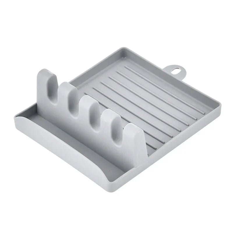 grey kitchen counter top pot lid and utensil rest