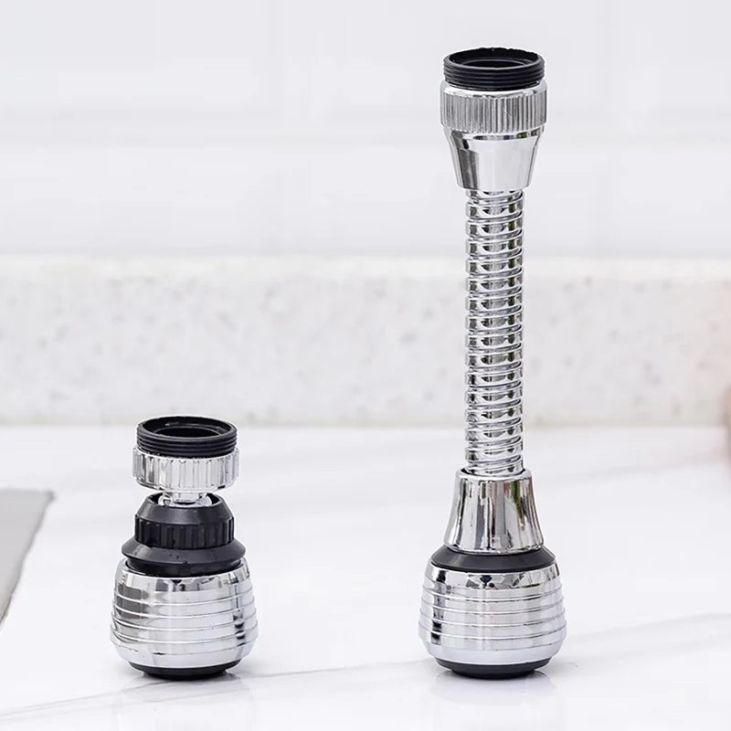 Two chrome kitchen faucet extenders on a white marble surface