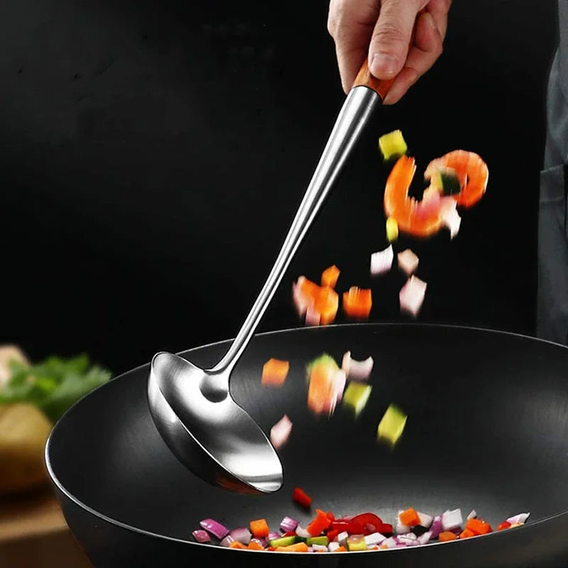 stir frying in a wok with a wok ladle
