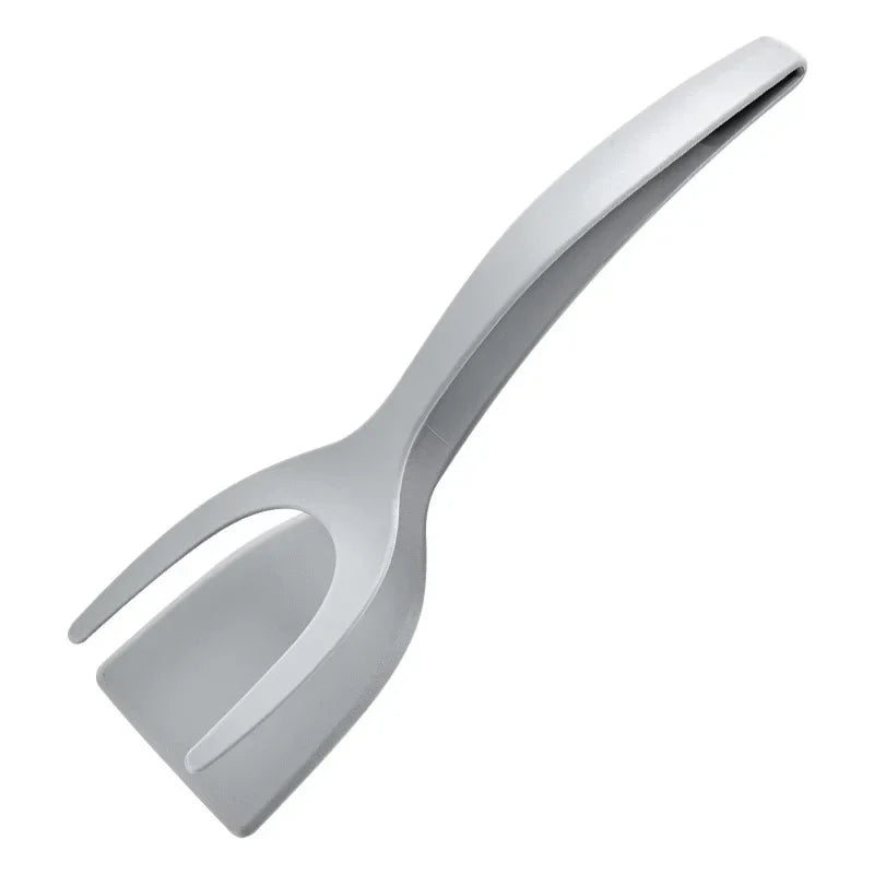 Grey spatula tongs on a white background