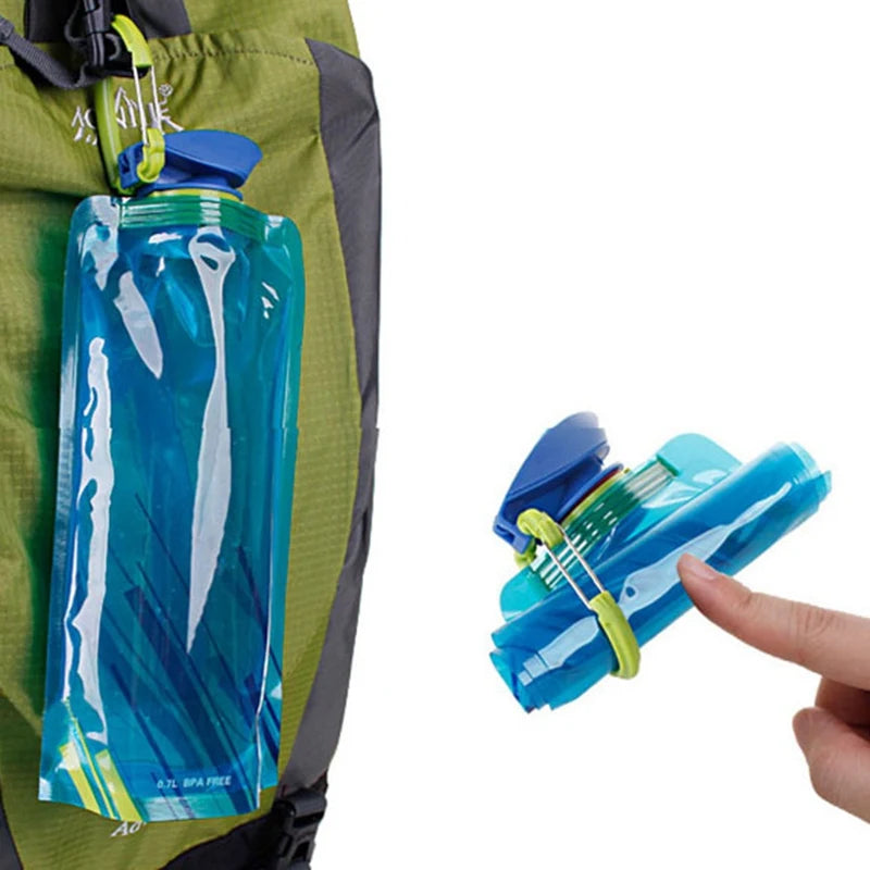 700ml blue folded flat hiking water bottle and one on a hikers backpack