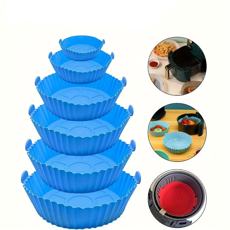 Set of 6 blue silicone air fryer inserts with smiley face design on a white background.