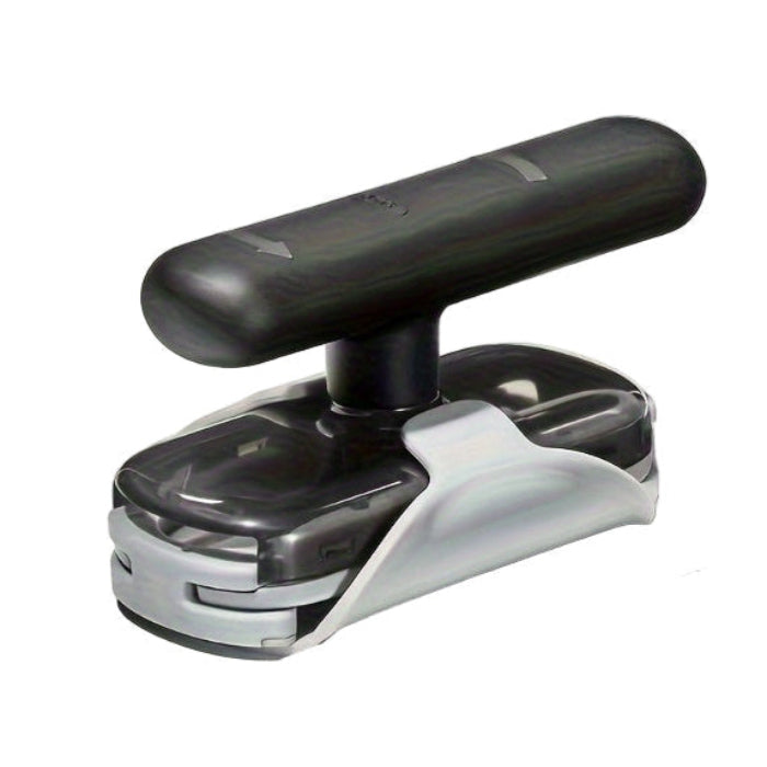 Black and silver jar opener on a white background