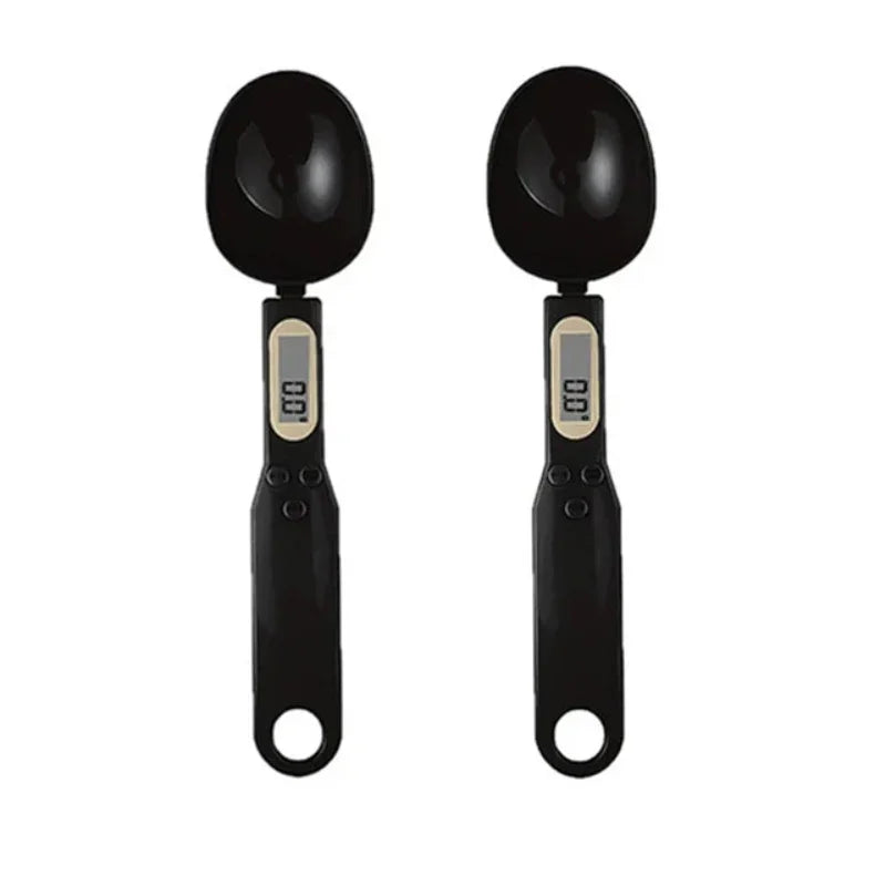 two black digital display measuring spoons