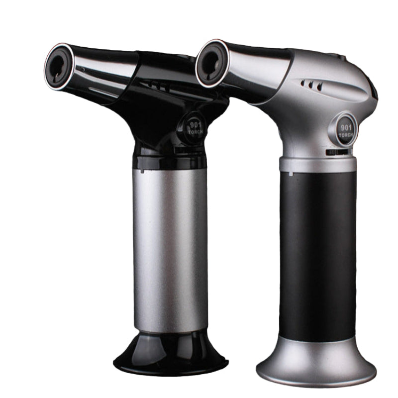 Black and silver butane torches on a white background