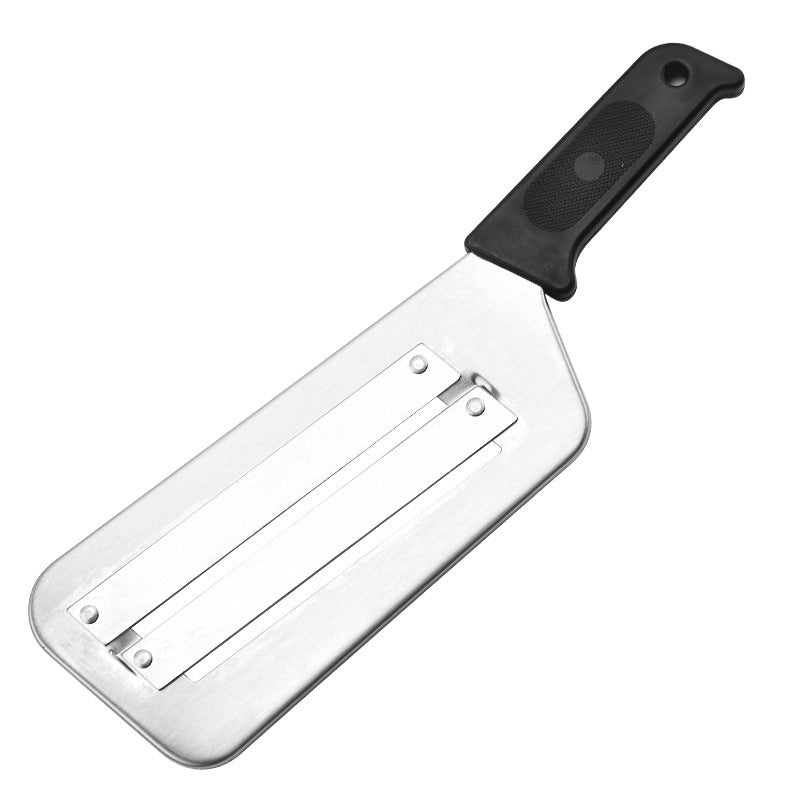 stainless steel cabbage shredder with a black handle on a white background