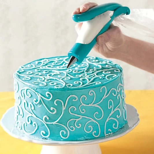 Turquoise cake being decorated with a piping bag on a yellow surface