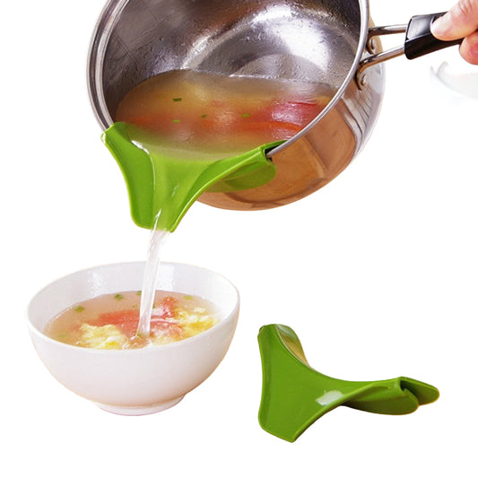 green clip on pot funnel pourer pouring soup into a white dish