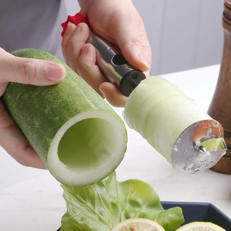 person coring zuchinni with a steel corer tool