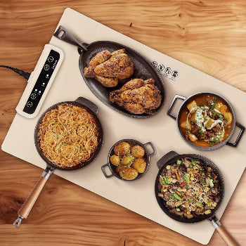 food heating mat on a wooden kitchen countertop