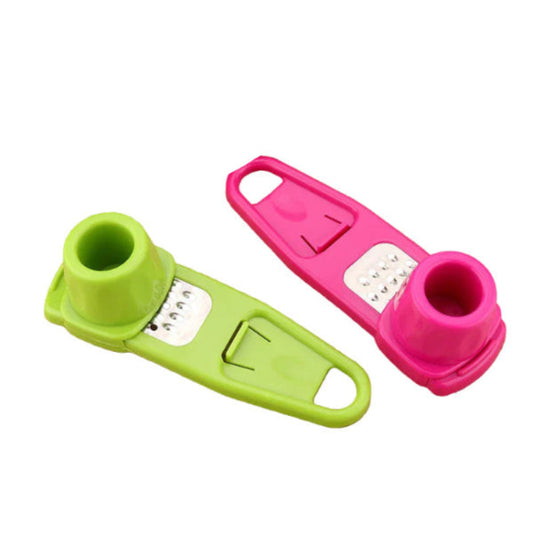 pink and green mini grater tools on a white background