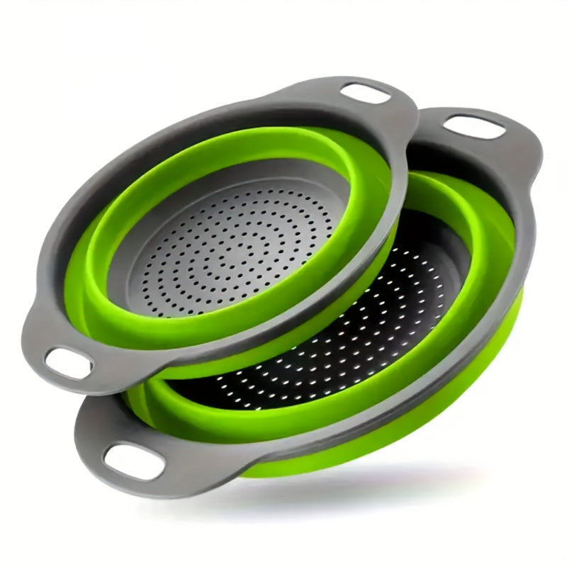 Collapsible colander with green interior and gray exterior on a white background