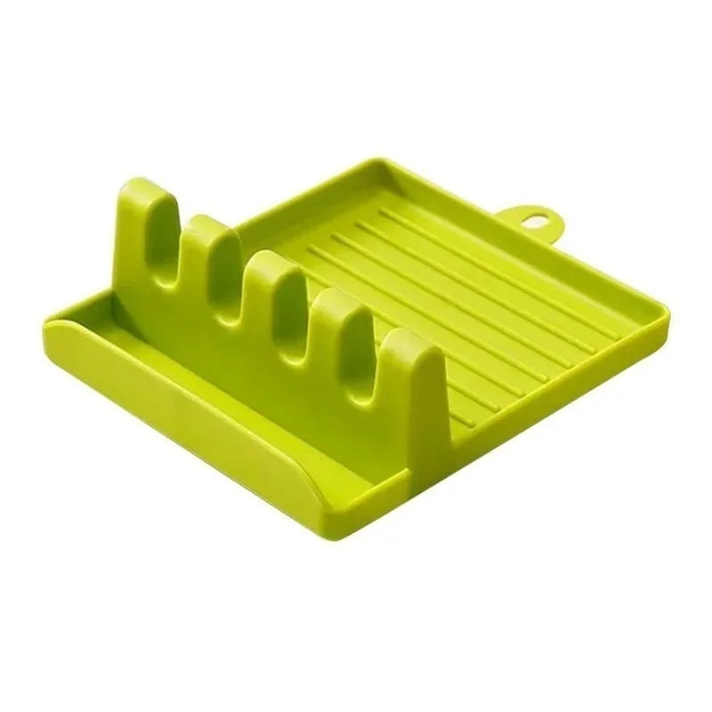 green kitchen counter top pot lid and utensil rest