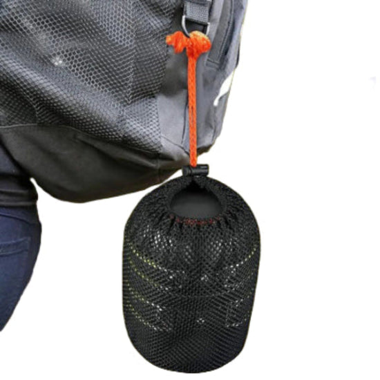 hiking cookware set on a hikers bag