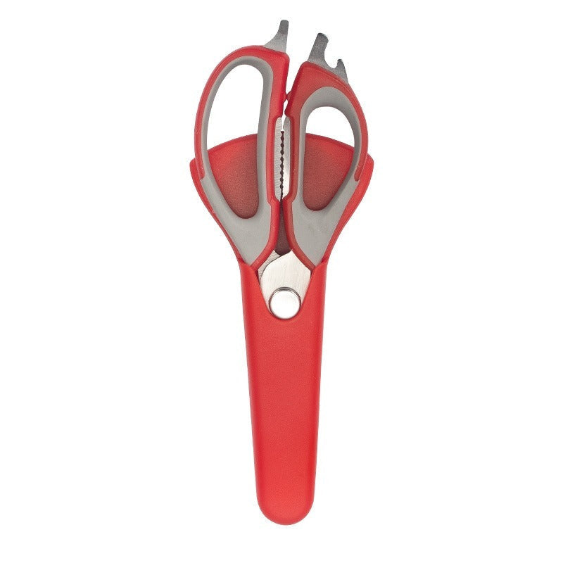 red and grey kitchen scissors in a red holder