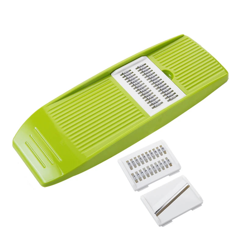 green mandolin slicer with two steel blades