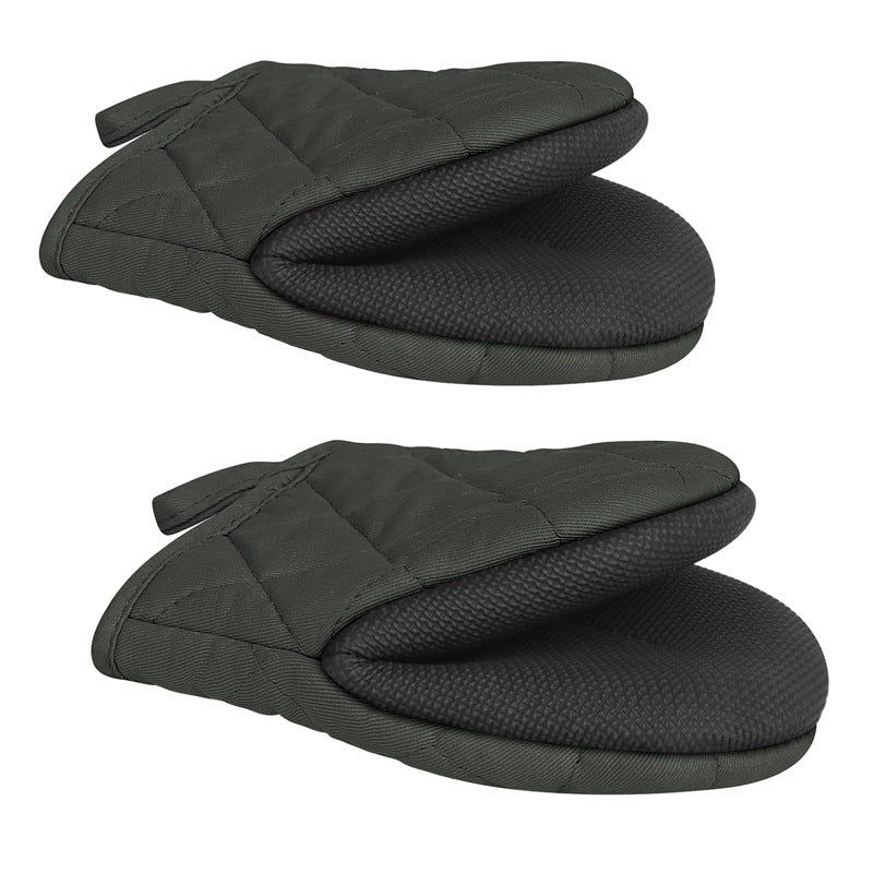 Pair of black oven mitts on a white background