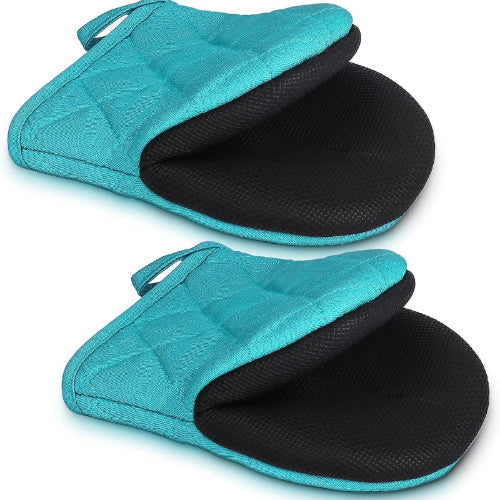 Two turquoise oven mitts with black interior on a white background