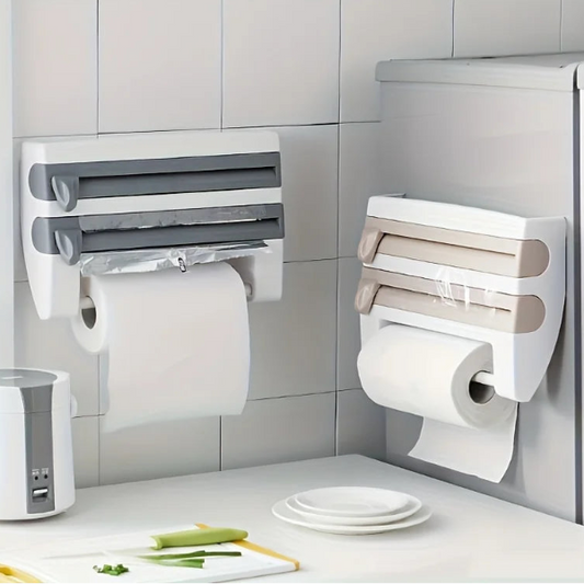 Two wall-mounted paper towel holders with rolls of paper towels on a tiled kitchen wall.