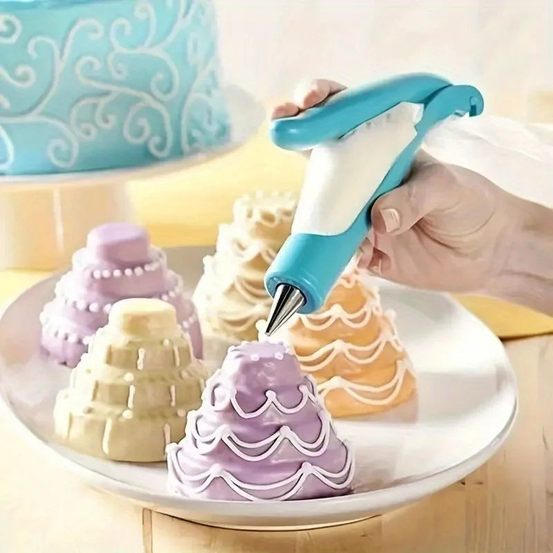 Hand using a blue and white icing piping tool to decorate small cakes 