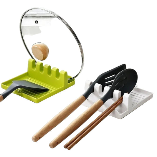 green and white counter top utensil and pot lid rests