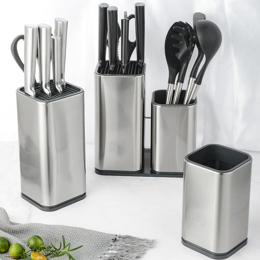 Set of stainless steel kitchen utensil holders with knives, spatulas, and other tools on a white background.