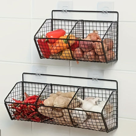 Two black wire wall baskets with food items on a white wall.
