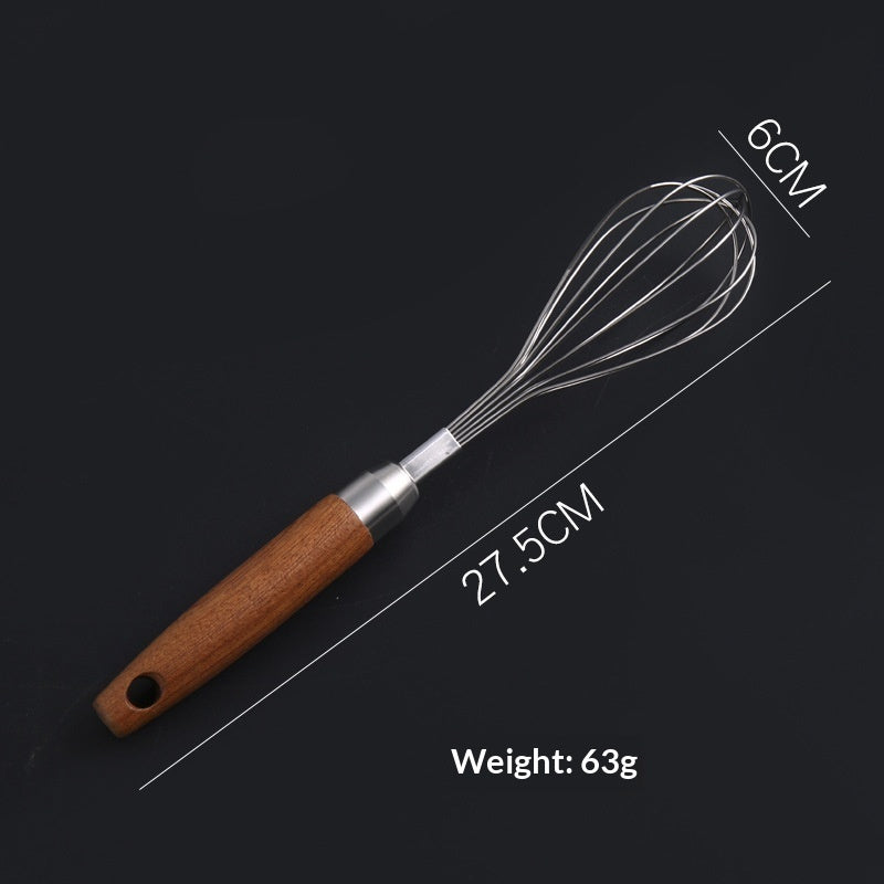 Whisk with wooden handle and measurements on a black background