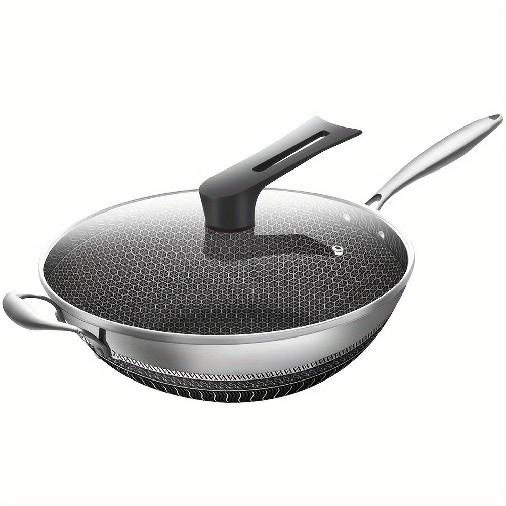 Stainless steel wok with a glass lid on a white background